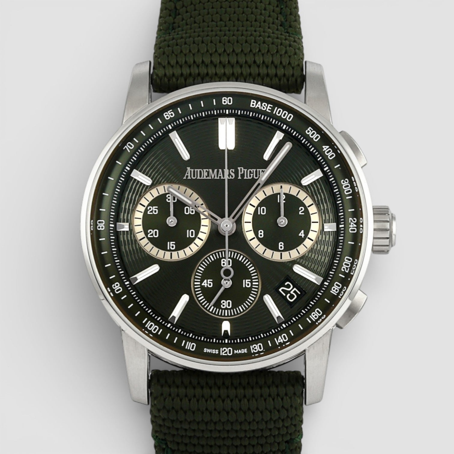 Audemars Piguet watch with black face and green strap on a white background