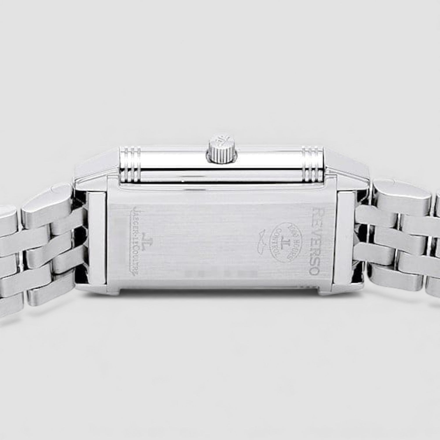 Close-up of a silver watch with a detailed backplate Jaeger-lecoultre-reverso-lady Silver bracelet