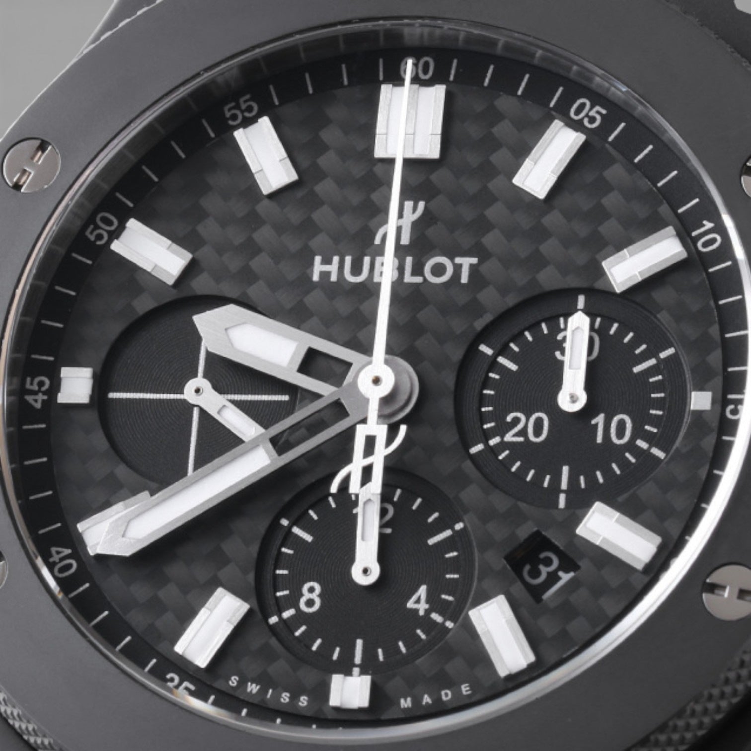 Hublot watch face with black dial and white accents
