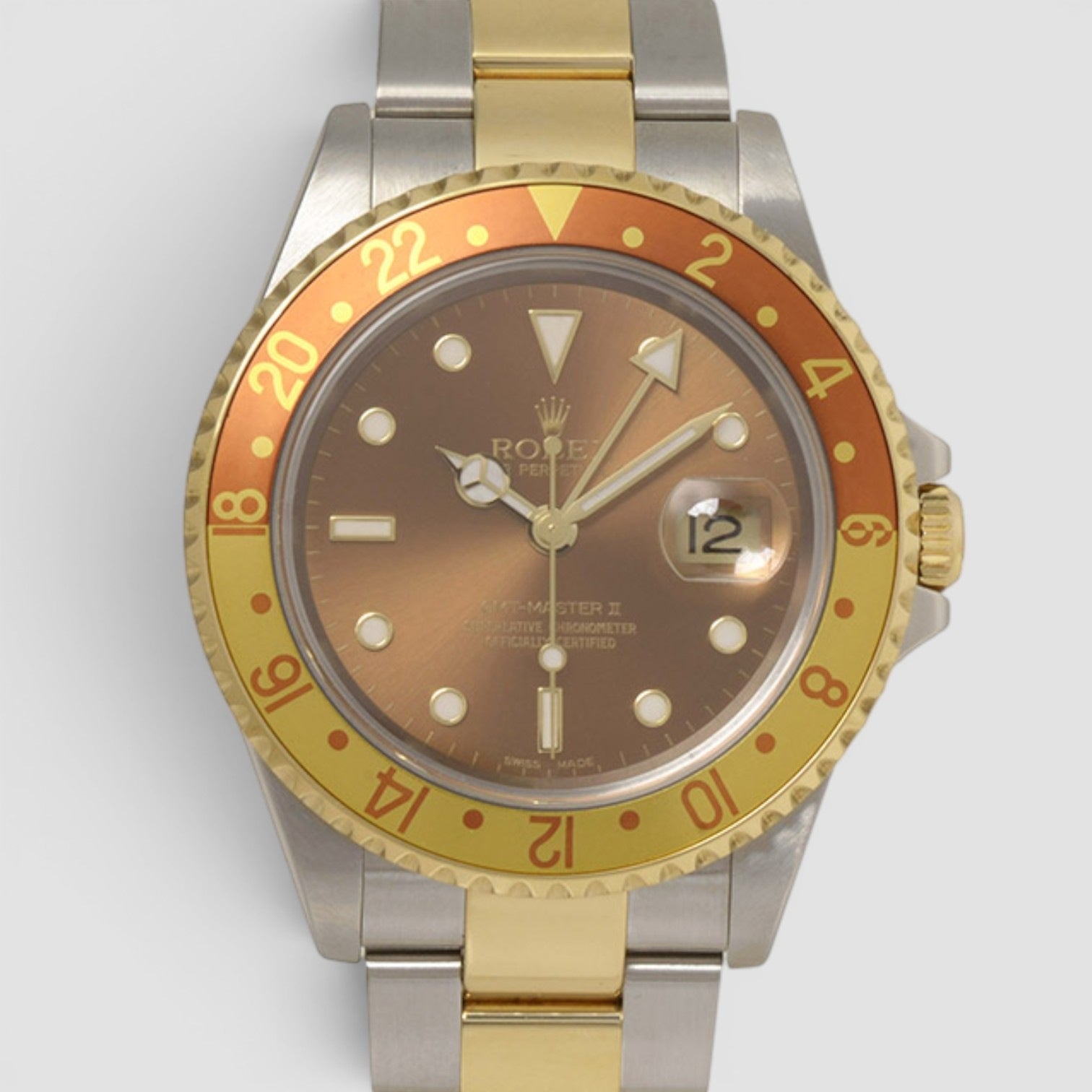 ローレル ゴールド Rolex GMT-Master II 40mm Steel & Yellow Gold Root Beer Dial Ref. 16713