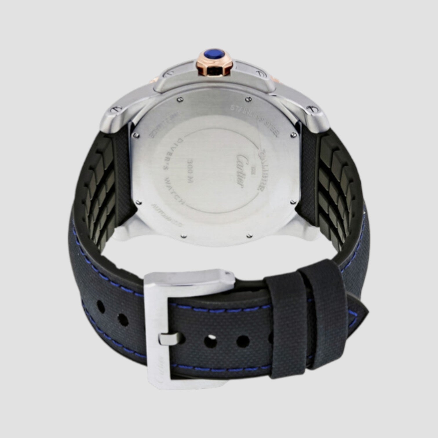 Back view of a Cartier watch with black strap and silver case on a light gray background