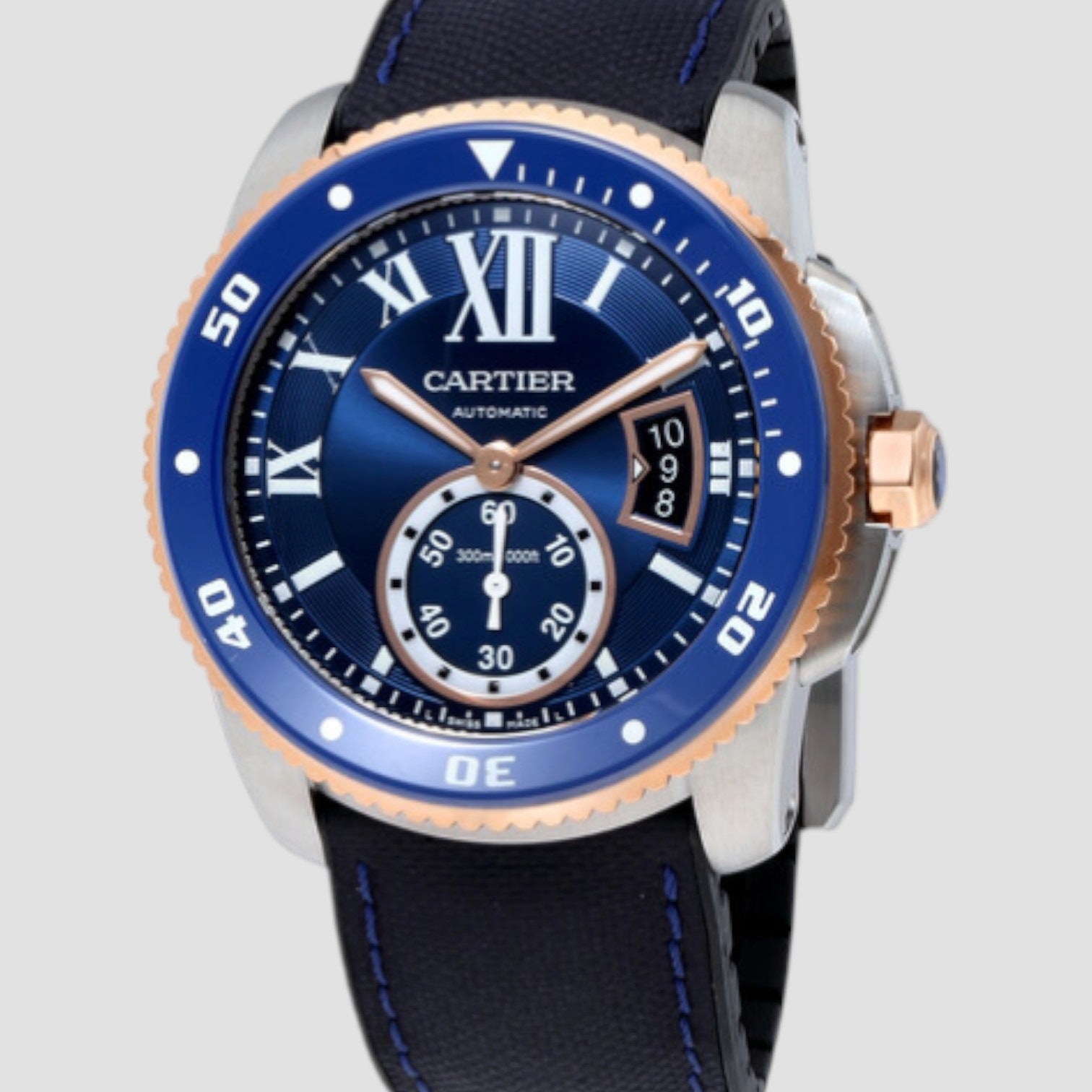 Cartier watch with blue dial and black strap on a light gray background
