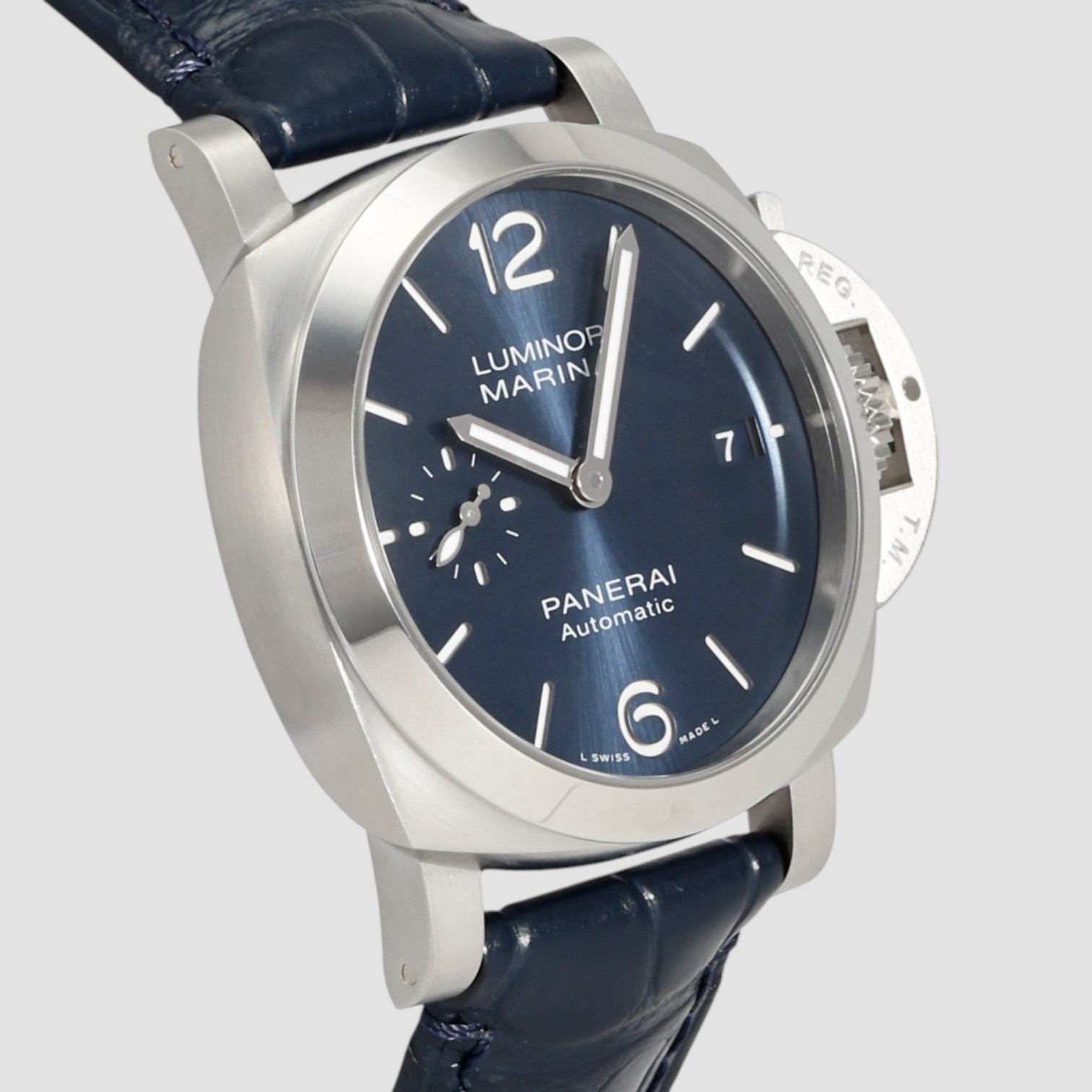 Panerai watch with blue face and leather strap on a light gray background